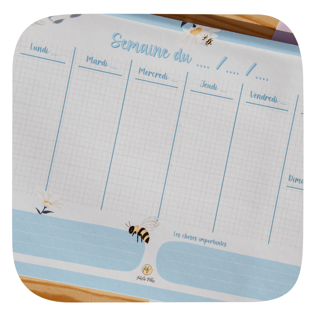 planner hebdomadaire du lundi au dimanche avec des tons bleus ainsi que des illustrations d'abeilles et de marguerites